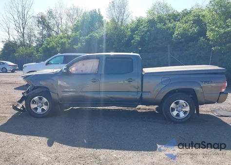 2015 Toyota Tacoma Base V6 из США, поврежденный, VIN 3TMMU4FN5FM082376